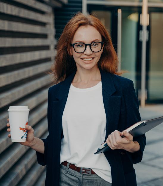 httpselements.envato.comhappy beautiful red haired businesswoman with lapt wnfsvfd2.jpg